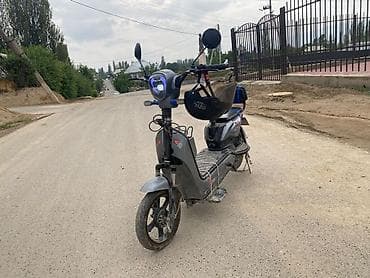 Мототехника: Электроскутер (городской) серого цвета Описание и особенности: - — 4