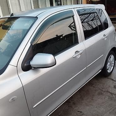 byd plus: Mazda Demio: 2004 г., 1.4 л, Автомат, Бензин, Седан — 4