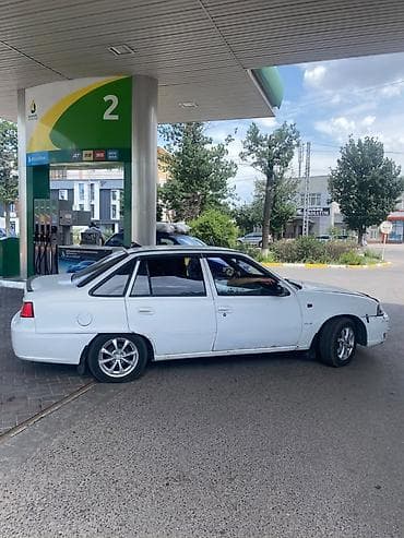 e2 byd: Daewoo Nexia: 2008 г., Механика, Седан — 7