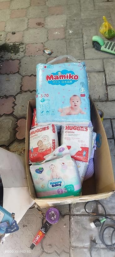 Обменяю памперсы на масло растительное. на продукты питания. мамико
