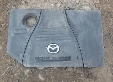 mazda 2: Крышка — 1