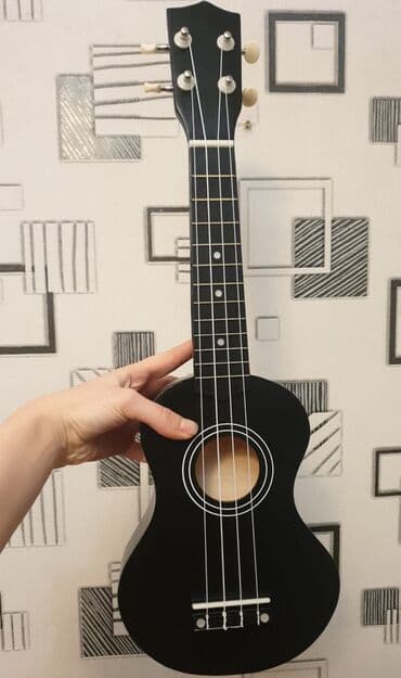 фагот музыкальный инструмент: Укулеле сопрано, классическая форма, цвет — матовый черный.В отличном — 2