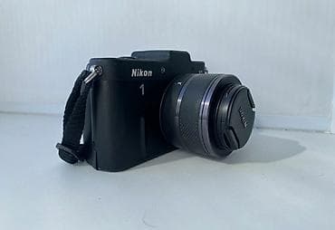 Nikon 1 V1 — компактная беззеркальная камера для путешествий, уличной