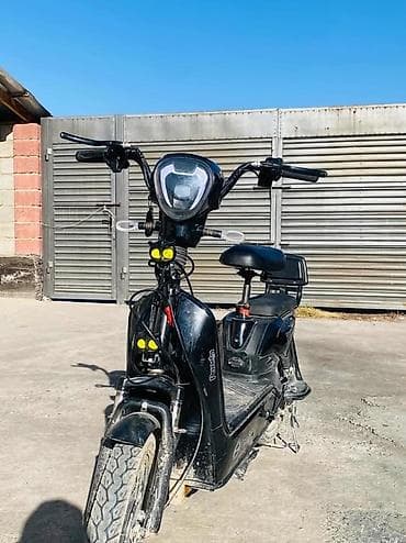 донголок 14 с: Электроскутер (городской мопед) черного цвета. Характеристики и — 1