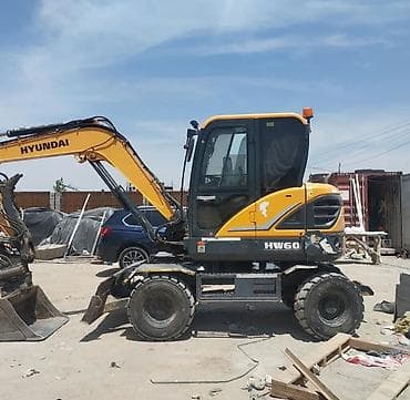 q 7: Экскаватор, Hyundai, Колесный — 1