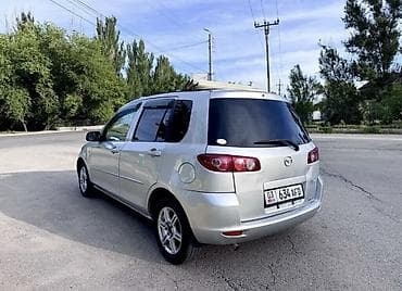 чекол машина: Mazda Demio: 2004 г., 1.3 л, Автомат, Бензин, Хэтчбэк — 5