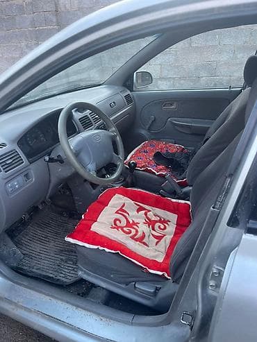 автомобиль тико: Kia Rio: 2005 г., Механика, Бензин, Хетчбек — 6