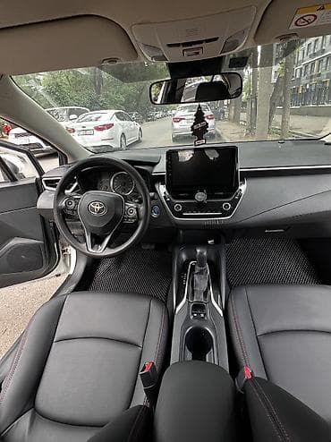 e2 byd: Toyota Corolla: 2019 г., 1.8 л, Вариатор, Гибрид, Седан — 10