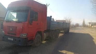 t 25: Тягач, Howo, 2007 г., Бортовой — 1