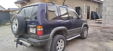 въезд: Isuzu Bighorn: 1997 г., 3.2 л, Автомат, Газ, Внедорожник — 5
