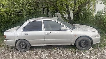 под восстановления: Mitsubishi Lancer: 1996 г., Ручные, Седан — 2