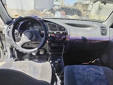 аудио касета: Daewoo Lanos: 1997 г., 1.5 л, Ручные, Бензин, Седан — 5