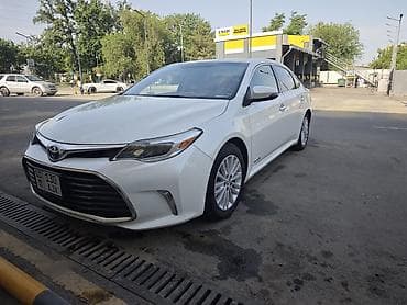 Toyota Avalon: 2015 г., 2.5 л, Вариатор, Гибрид, Седан — 2