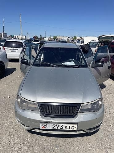 Седан серебристого цвета с киргизскими номерными знаками (04 KG 273 at lalafo.kg Седан серебристого цвета с киргизскими номерными знаками (04 KG 273