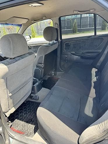 aida: Mazda 626: 1999 г., 1.8 л, Бензин, Седан — 7