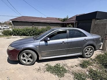 Транспорт: Mazda 6: 1999 г., 2 л, Механика, Бензин, Седан — 5