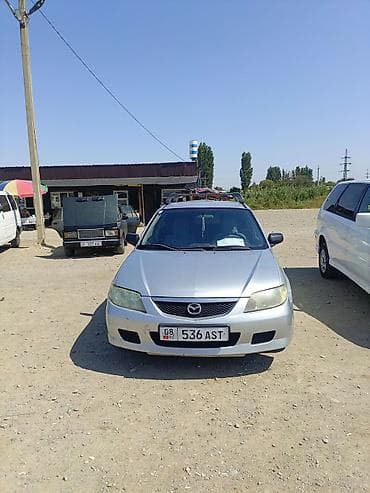 выбор номера о: Mazda 323: 2002 г., Механика, Бензин, Универсал — 1