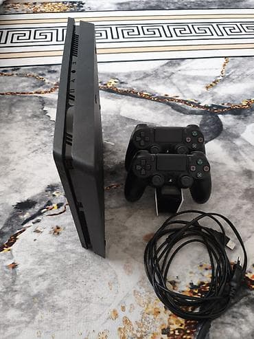 game controller: PlayStation 4 Slim (черная) Комплектация: - консоль PS4 Slim - 2 — 3
