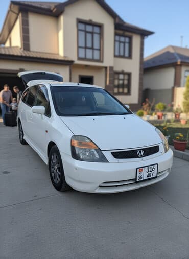 обмен на частный дом: Honda Stream: 2002 г., 2 л, Автомат, Бензиновая, Минивэн — 2