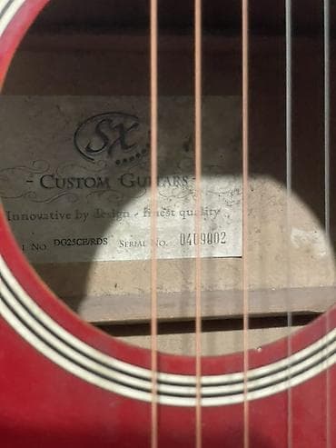 детские гитары: Акустическая гитара SX (логотип на головке грифа). Формат корпуса — — 8