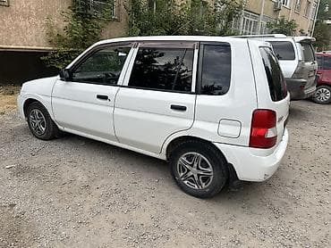 Mazda Demio: 2001 г., 1.3 л, Автомат, Бензин, Хэтчбэк