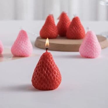 электронный свеча: Декоративная свеча в форме клубники, выполненная в красном и розовом — 1