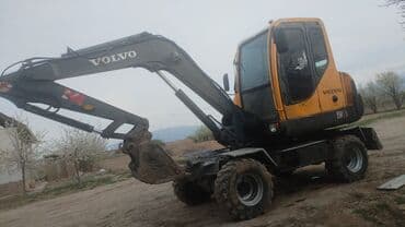 шыны на трактор: Экскаватор, Volvo, 2000 г., Колесный — 6