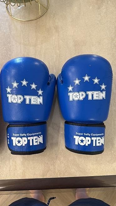 кикбокс шорты: Боксерские перчатки TOP TEN - Пара перчаток бренда TOP TEN. - Цвета — 2