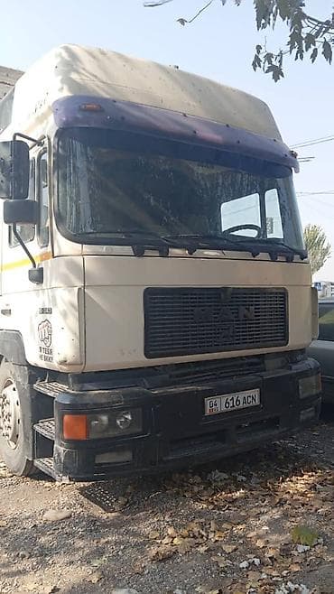 сканиа тандем: Грузовой автомобиль MAN с тентованным фургоном - Марка/модель: MAN — 3