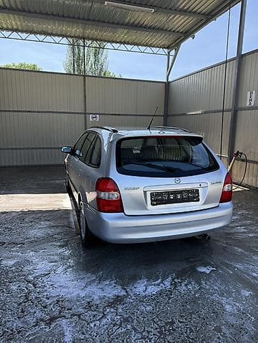 mercedesbenz 211: Mazda 323: 2000 г., Механика, Бензин, Универсал — 3