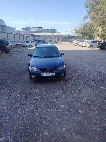 subaru forester 2001: Mazda 323: 2002 г., Механика, Хэтчбэк — 8