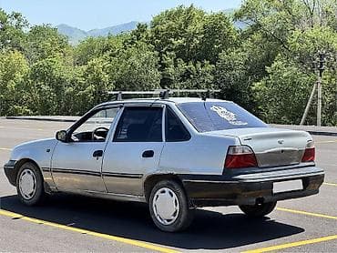 асфальт рез: Daewoo Nexia: 2004 г., 1.6 л, Механика, Бензин, Седан — 3