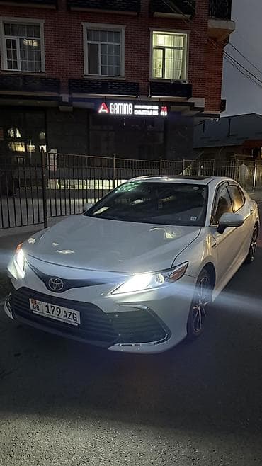 lexus e: Toyota Camry: 2021 г., 2.5 л, Автомат, Гибрид, Седан — 2