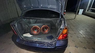 suzuki grand vitara машина: Suzuki Aerio: 2006 г., 2.3 л, Автомат, Бензин, Седан — 10