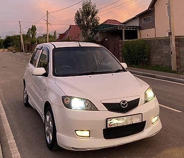 Mazda Demio: 2003 г., 1.5 л, Автомат, Бензин, Хэтчбэк