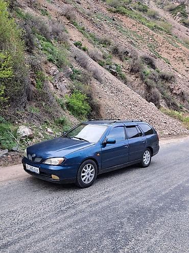 e star: Nissan Primera: 2000 г., 1.8 л, Механика, Бензин, Универсал — 1