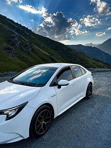 byd e2 2019: Toyota Corolla: 2023 г., 1.8 л, Вариатор, Гибрид, Седан — 8
