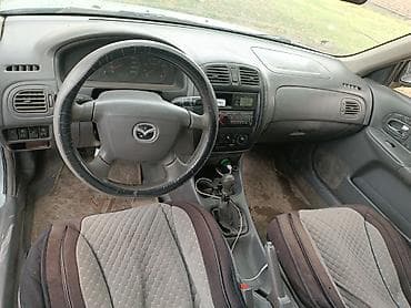 Продажа авто: Mazda 323: 2000 г., 1.8 л, Механика, Бензин, Хэтчбэк — 1