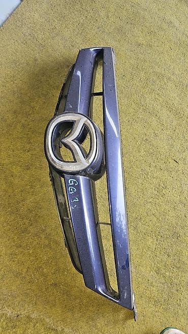 suzuki gn: Решетка радиатора Mazda Б/у — 1