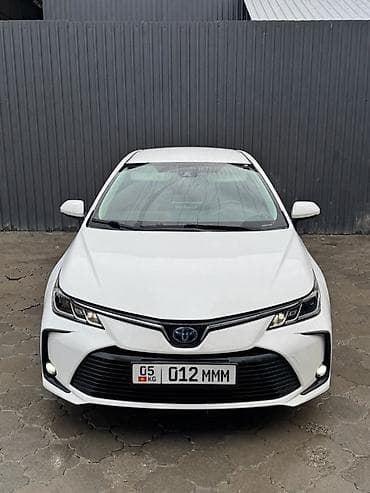 byd e9: Toyota Corolla: 2019 г., 1.8 л, Вариатор, Гибрид, Седан — 1
