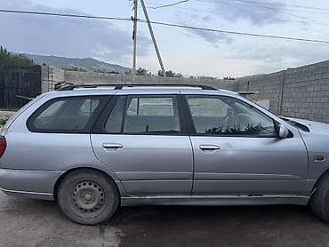 124 e500: Nissan Primera: 2000 г., 1.8 л, Механика, Бензин, Универсал — 3