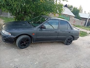 Mitsubishi Lancer: 1995 г., 1.3 л, Механика, Бензин, Седан