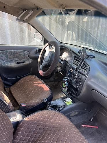 Унаа: Daewoo Lanos: 1997 г., 1.5 л, Кол менен иштөөчү, Бензин, Седан — 3