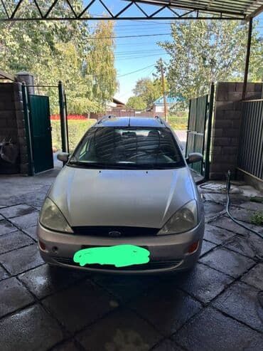 срочно продам авто в связи с переездом: Ford Focus: 2001 г., 1.6 л, Механика, Бензиновая, Универсал — 1