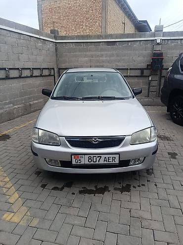 бакту долонотуу: Mazda 323: 2000 г., 1.5 л, Кол менен иштөөчү, Бензин, Хетчбек — 2
