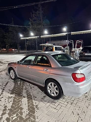 простой: Subaru Impreza: 2001 г., 2 л, Автомат, Газ, Седан — 2