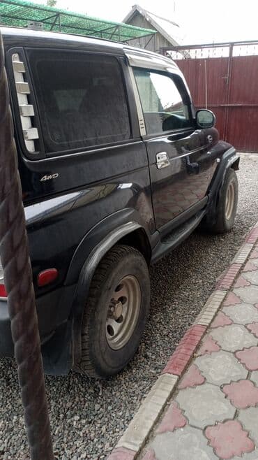 кара добо: Ssangyong Korando: 2002 г., 2.3 л, Автоматические, Газ, Внедорожник — 4