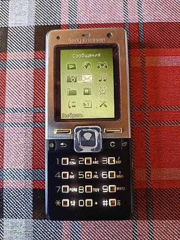 Sony Ericsson T650i, < 2 ГБ, цвет - Серебристый