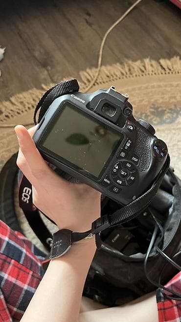 Фотоаппараты: Зеркальная камера Canon EOS 1200D с комплектным объективом Canon Zoom — 7