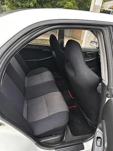 наконечник: Subaru Impreza: 2000 г., 2 л, Механика, Бензин, Седан — 7